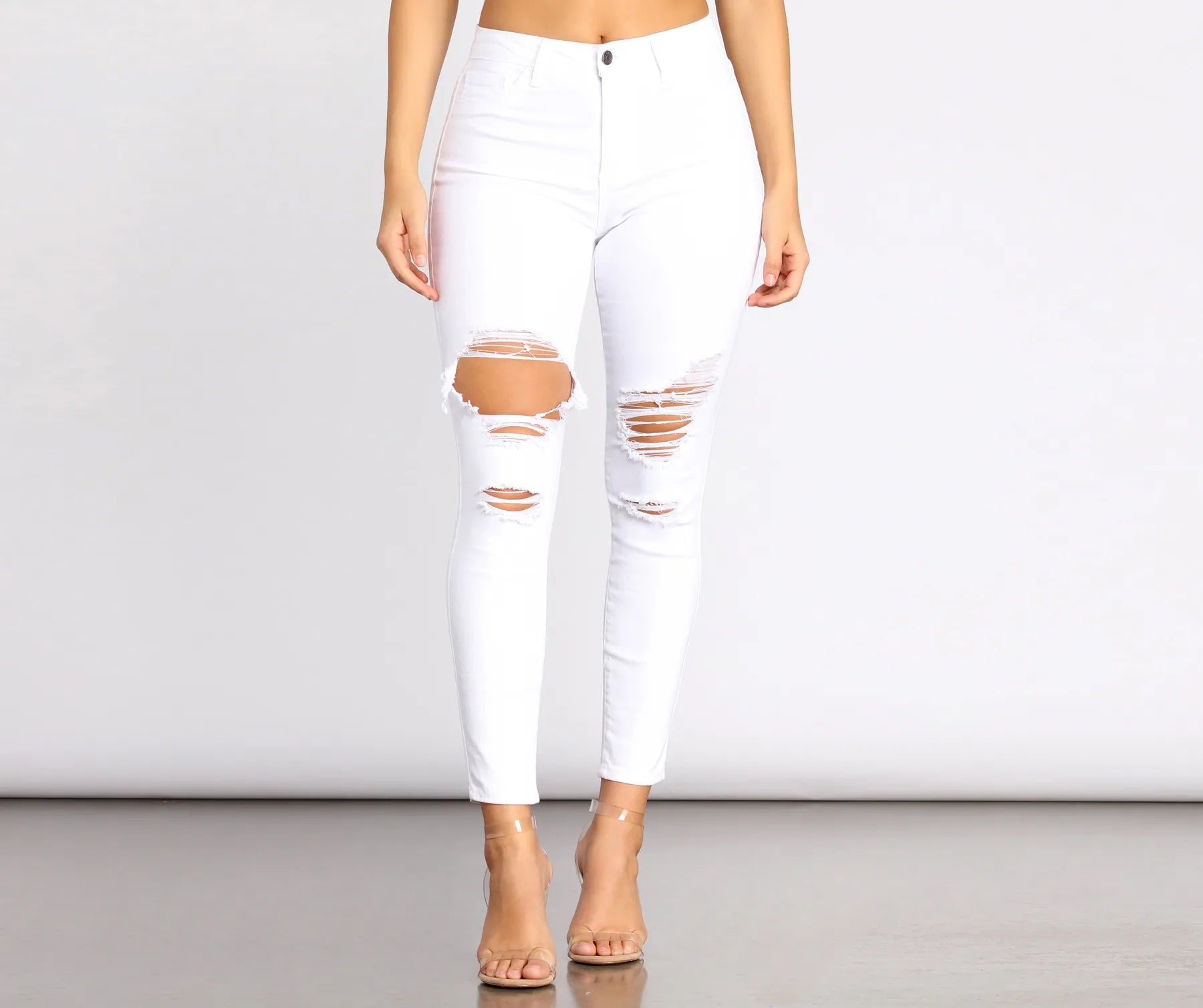 High Rise Destructed Denim Skinny Jeans