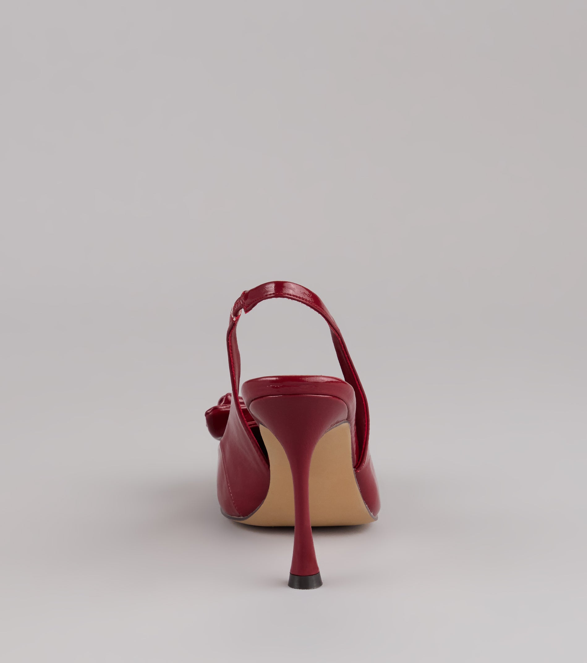 Strut Season Bow Stiletto Pumps