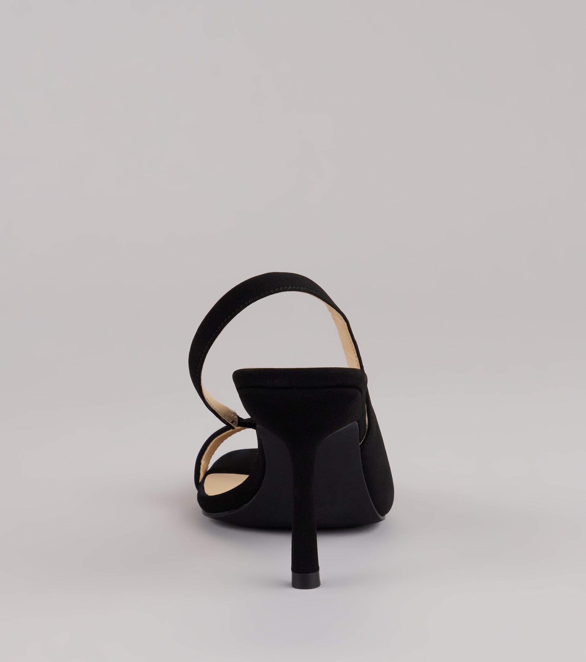 Strut Ready Sling-Back Stiletto Pumps