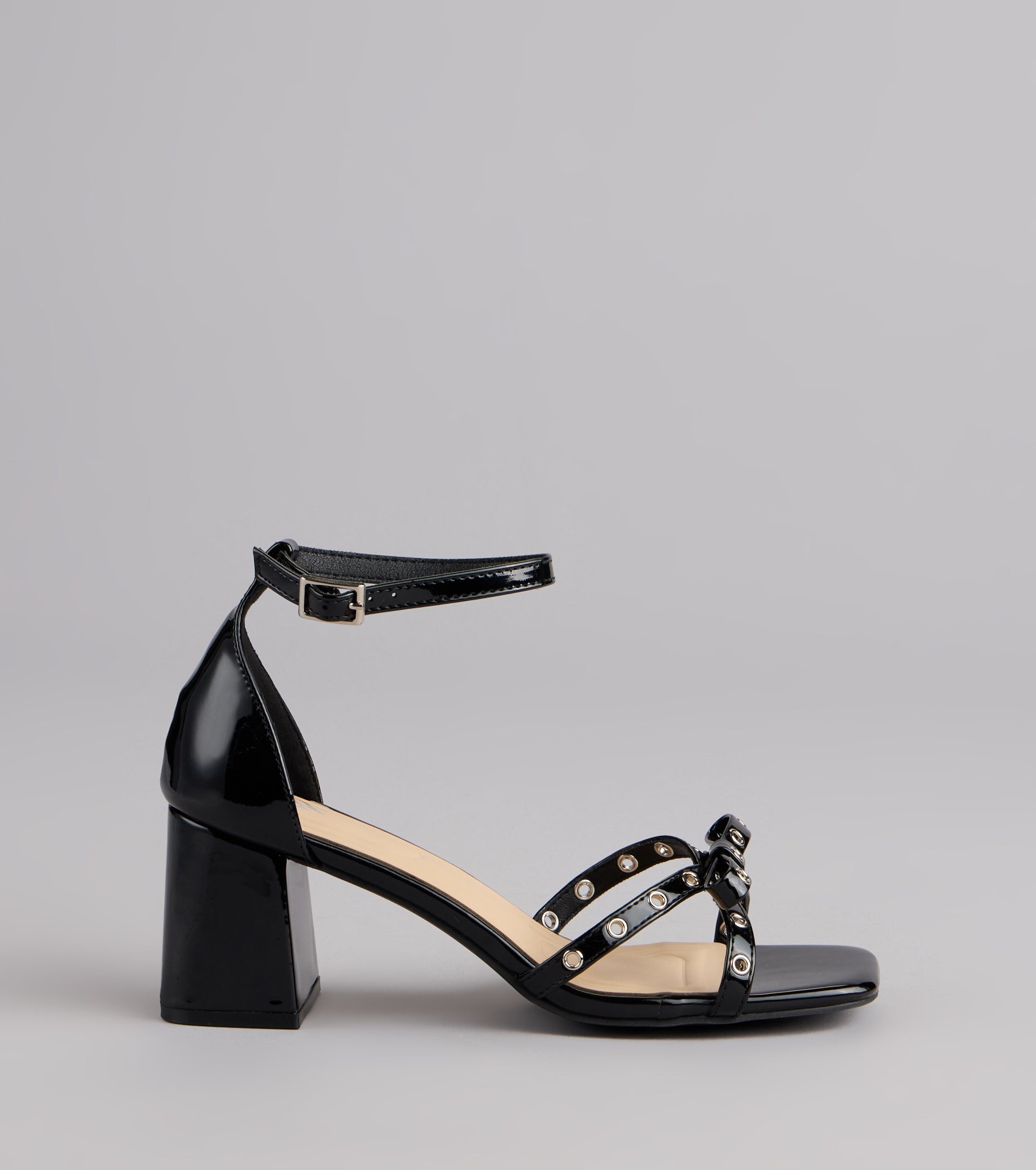 City Lights Bow Grommet Block Heels