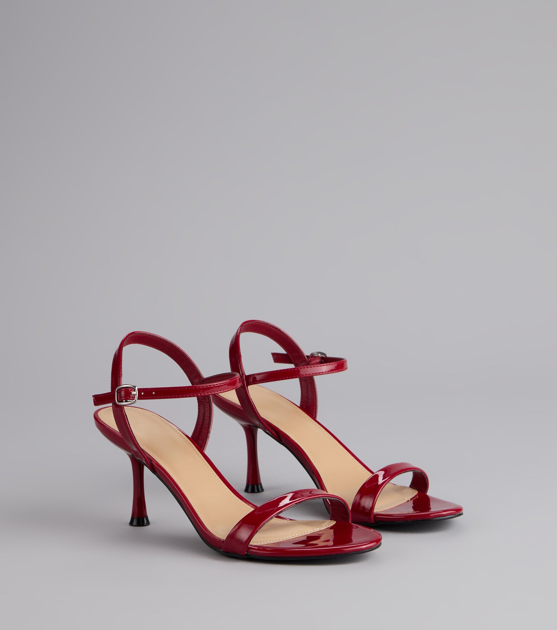 Sleek And Simple Patent Kitten Heels